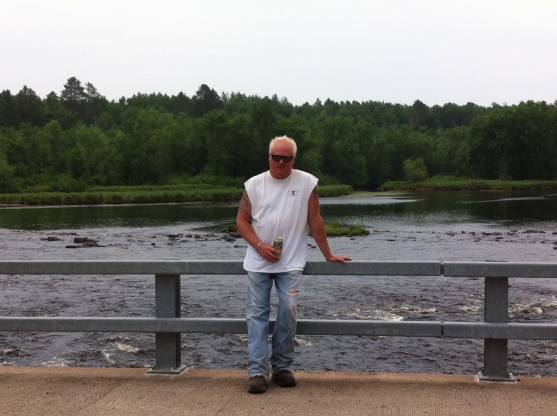 My husband Keith on a bridge along a scenic atv trail near Danbury, WI